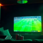 Experience the thrill of live soccer betting with Vaoluoitv, featuring a vibrant home setup and engaging atmosphere.