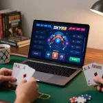 Person enjoying an engaging poker session on SKY88 platform, laptop displaying live game interface with chips and cards.