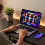 BOM88 player enjoying an immersive online casino experience with vibrant slot games on laptop